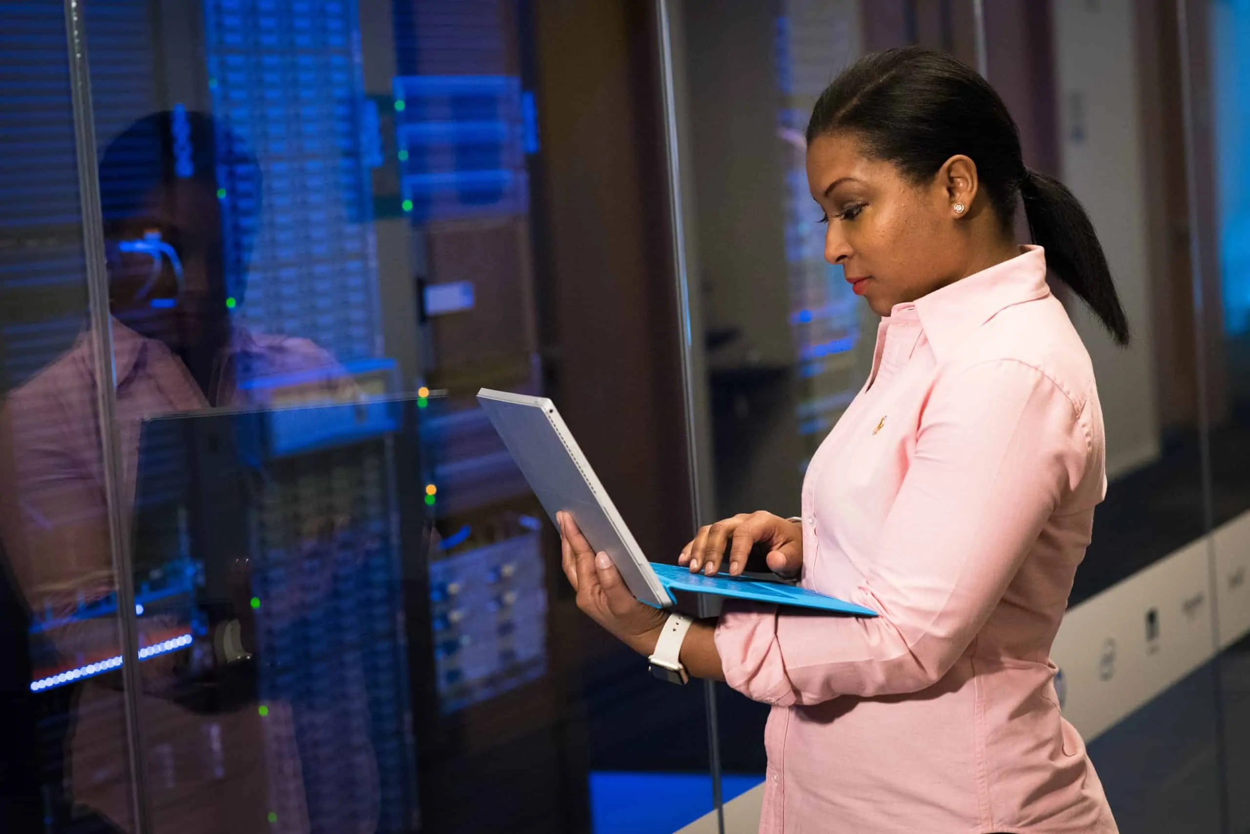 adult african american woman in server room