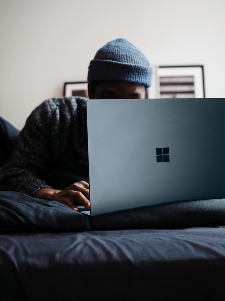 man working on laptop