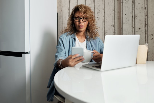 woman looking at phone